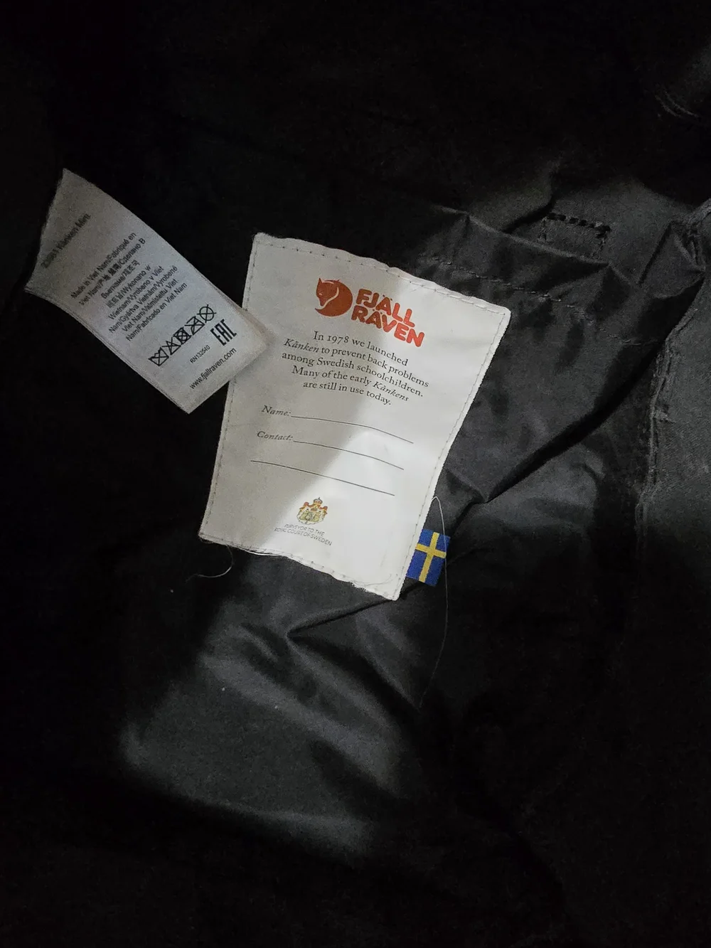 Fjallraven Black Backpack with Red Logo